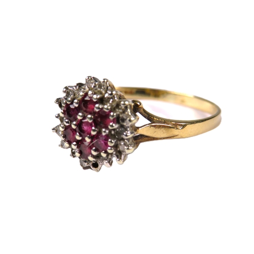 342 - 9ct Yellow Gold Ruby & Diamond Cluster set in a flower pattern.   Finger size 'O'   2.1g