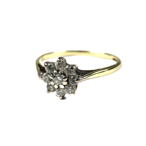 344 - 9ct Yellow Gold Diamond set ring in a flower pattern.   Finger size 'O'   1.4g