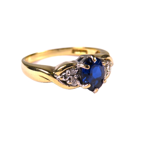 345 - 9ct Yellow Gold Ring set with an Oval Central Sapphire, Groups of Melee Diamonds to shoulders.  Fing... 