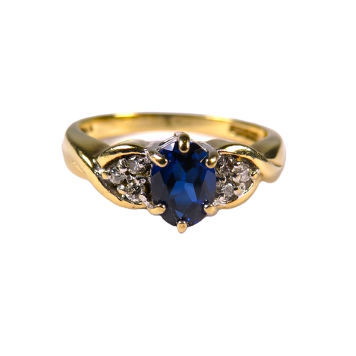 345 - 9ct Yellow Gold Ring set with an Oval Central Sapphire, Groups of Melee Diamonds to shoulders.  Fing... 