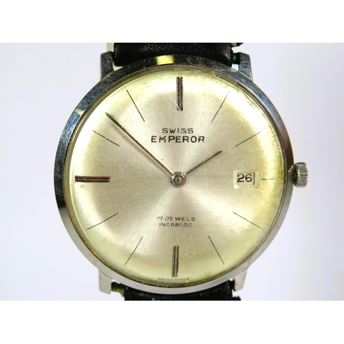 351 - 17 Jewel Swiss Emperor watch with date window. Leather strap, working order.