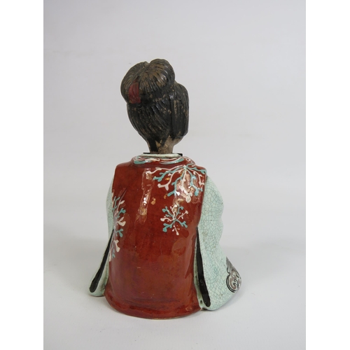 105 - Antique oriental ceramic nodding head figure, 13.5cm tall.