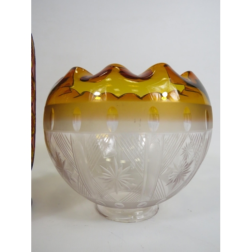 115 - Ruby cut to amber Bohemian uranium glass vase, slight chips to the rim. The vase stands 24cm tall. p... 