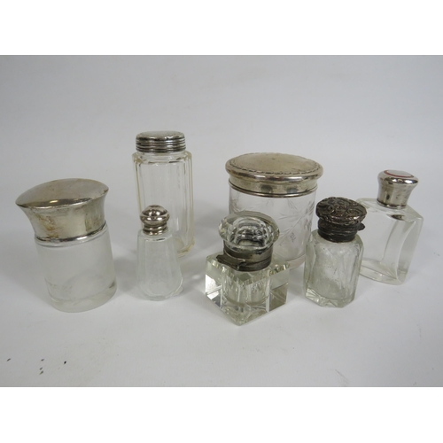 116 - Selection of mainly Sterling silver topped bottles and pots etc.