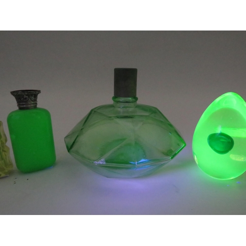 121 - 3 Uranium glass scent bottles and a paperweight by Murano.