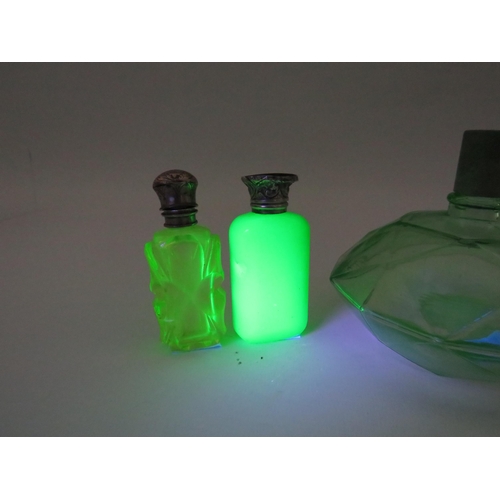 121 - 3 Uranium glass scent bottles and a paperweight by Murano.