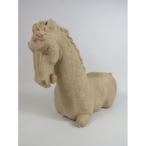 66 - Large Tang stone horse sculpture, approx 30cm tall and 48cm long.