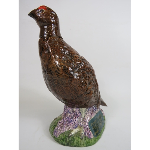 68 - Beswick Royal Doulton group Famous Grouse Scotch WhiskeyLiquor decanter bottle. 24cm tall.