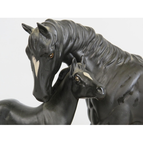 70 - Beswick Connoisseur model of Black beauty and foal standing on a wooden plinth.