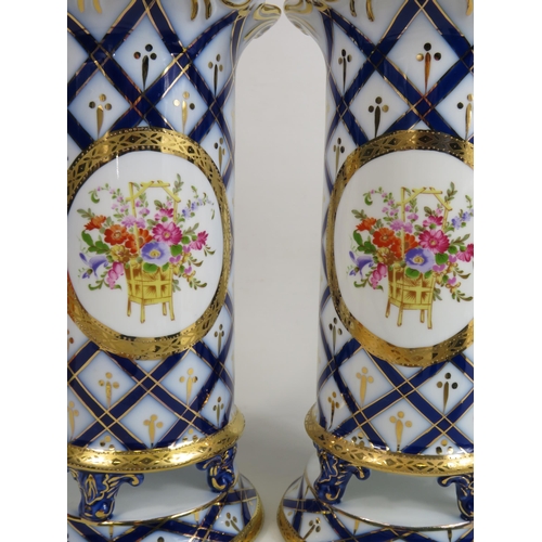 81 - Pair of Roselle Occ & Co Staffordshire vases with hand decorated flowers, approx 29cm tall.