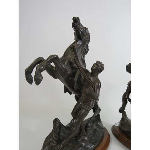 83 - Pair of vintage spelter Marley horses sculptures which stand approx 31cm tall.