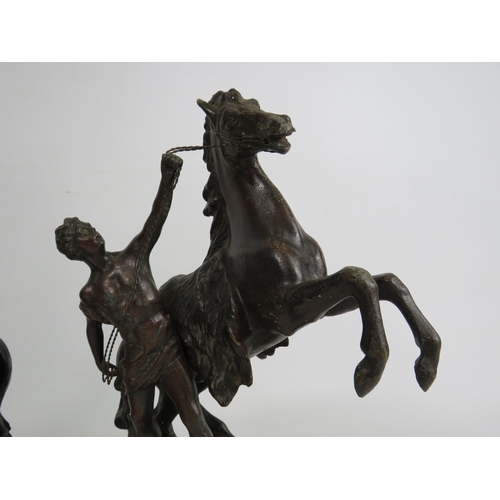 83 - Pair of vintage spelter Marley horses sculptures which stand approx 31cm tall.