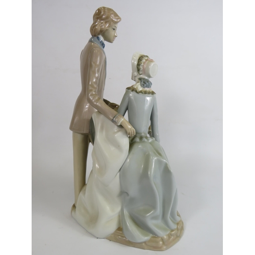 84 - Large Cascades porcelain figurine of a Gentleman and a lady, 38cm tall.