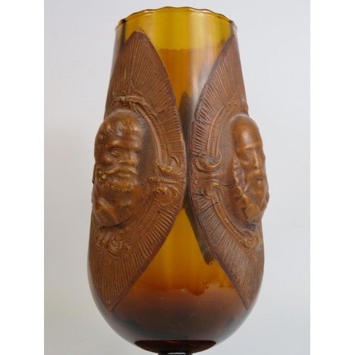 86 - Vintage leather embossed amber glass tall goblet Don quixote. 36cm tall.