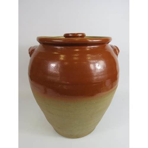 89 - Large antique Stoneware Olive or Flour storage jar, approx 17 inches tall. Has had a repair to the l... 