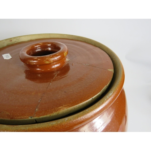 89 - Large antique Stoneware Olive or Flour storage jar, approx 17 inches tall. Has had a repair to the l... 