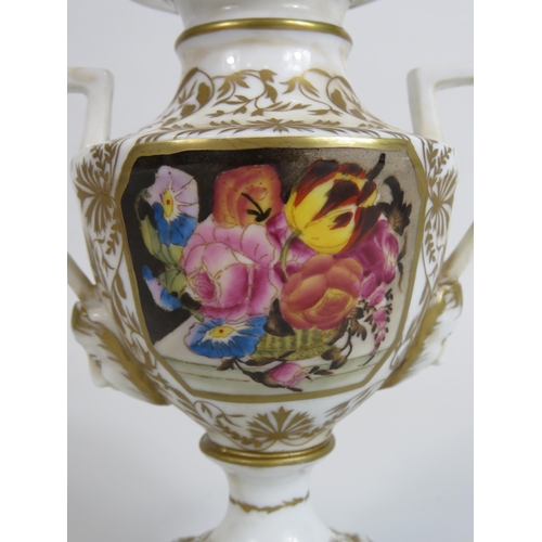 99 - Meissen style twin handle vase sitting on brass feet, 16cm tall.