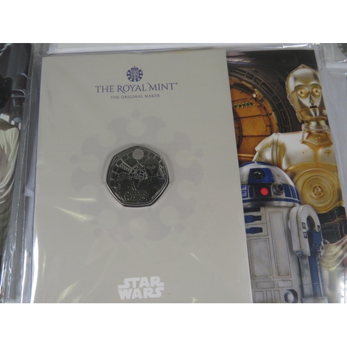 407 - Royal Mint 50p Presentation packs plus a £2 Flying Scotsman proof coin. See photos.