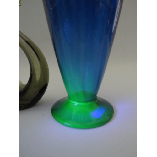 132 - Cobalt blue uranium glass vase, approx 23cm tall plus a art glass swan.