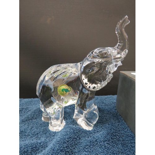 139 - Large and small waterford crystal elephant figurines. One with box.