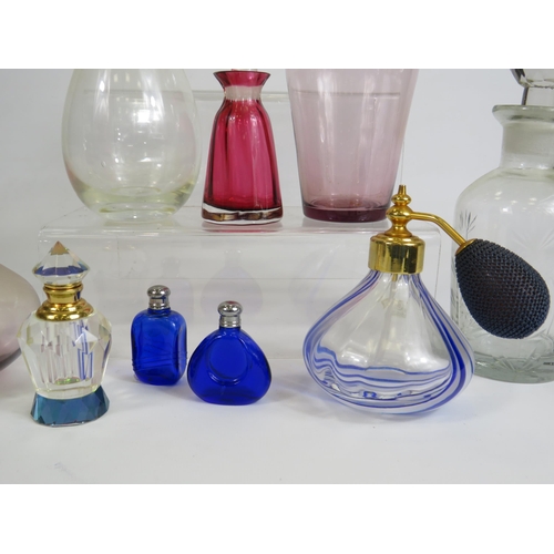 143 - Selection of various glass perfume / scent bottles including Caithness etc.