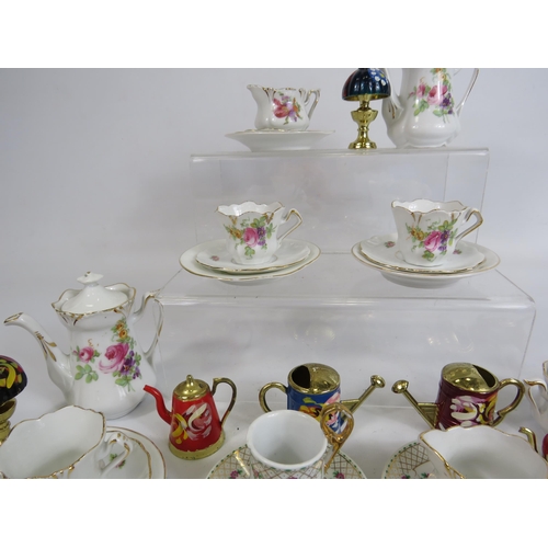 156 - Selection of Miniature teaset and mini barge ware items in ceramics and brass.