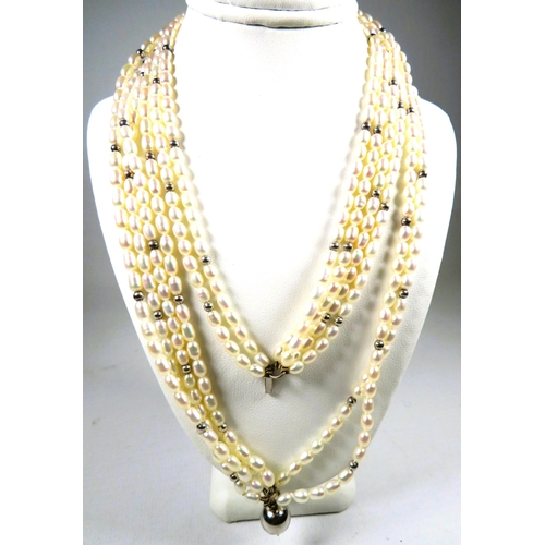 434 - Two set of Cultured Pearls. One a double strand Graduated set with 925 silver Clasp, the other a Six... 