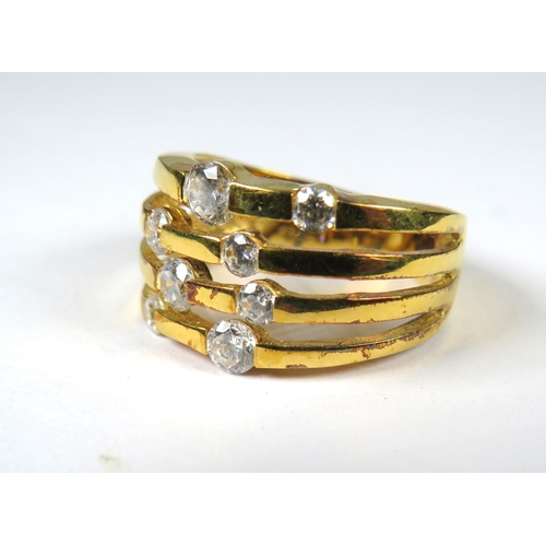 437 - 9ct Yellow Gold Ring set with CZ Stones on four strands in the patten of Pleiades Constellation.   F... 