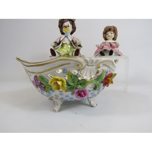 601 - A Dresden bowl with applied flowers and Two Zampiva Italian pottery figurines.