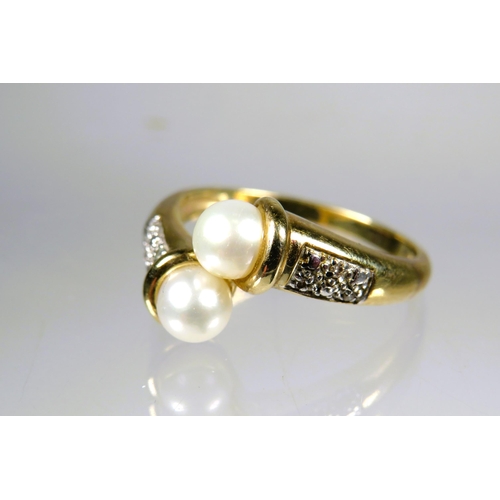 447 - Very Pretty  9ct yellow Gold ring set with twin pearls and Diamond set shoulders.  Finger size 'Q'  ... 