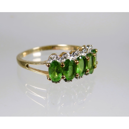 449 - 9ct Yellow Gold Ring set with a cluster of Green and Clear CZ gemstones.. Finger size 'M-5'   1.8g