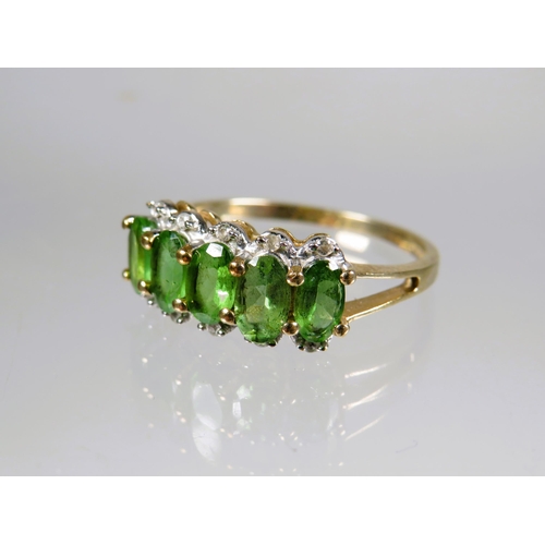 449 - 9ct Yellow Gold Ring set with a cluster of Green and Clear CZ gemstones.. Finger size 'M-5'   1.8g