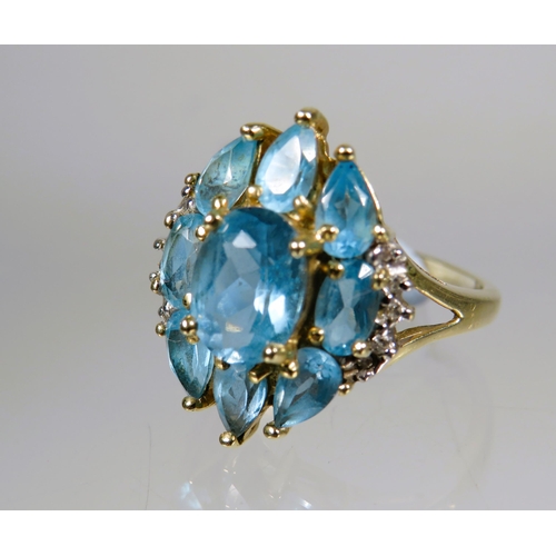 452 - Very Pretty 9ct Yellow Gold Ring set with multiple Aqua in an oval shield shape.  Finger size 'L-5' ... 