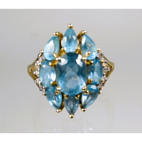 452 - Very Pretty 9ct Yellow Gold Ring set with multiple Aqua in an oval shield shape.  Finger size 'L-5' ... 