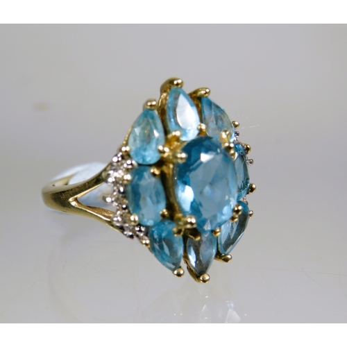 452 - Very Pretty 9ct Yellow Gold Ring set with multiple Aqua in an oval shield shape.  Finger size 'L-5' ... 