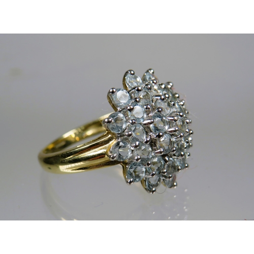 454 - 9ct Yellow Gold set with a CZ flower cluster.  Finger size 'M'    3.3g