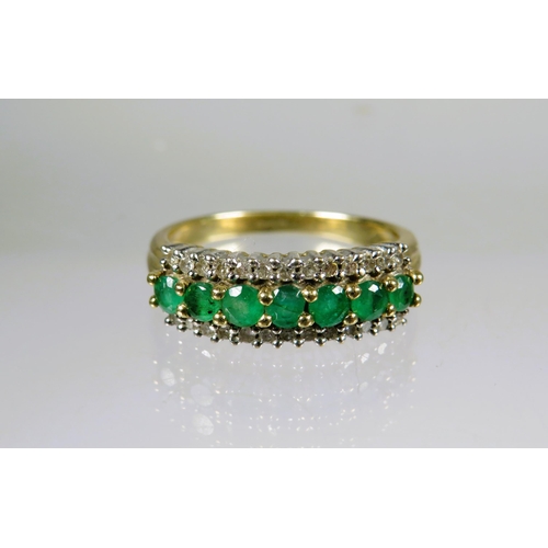 462 - 9ct Yellow Gold Ring set with Emerald Coloured CZ and Flanked by Twin rows of Melee Diamonds.  Finge... 