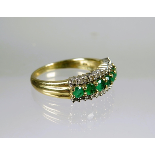 462 - 9ct Yellow Gold Ring set with Emerald Coloured CZ and Flanked by Twin rows of Melee Diamonds.  Finge... 