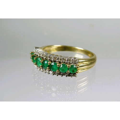 462 - 9ct Yellow Gold Ring set with Emerald Coloured CZ and Flanked by Twin rows of Melee Diamonds.  Finge... 