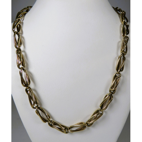 467 - 9ct Yellow Gold Chain made from Elongated Links. Measuring 18 inches long and weighs    31.2g