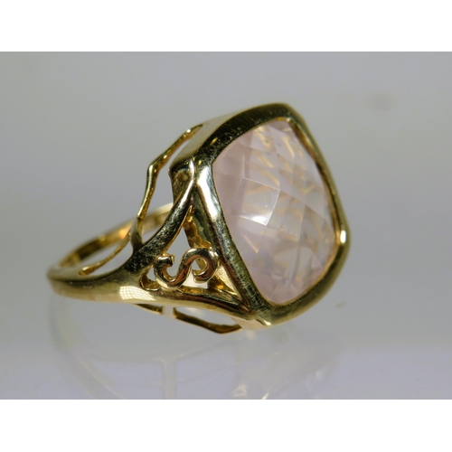 480 - 9ct Yellow Gold Ring set with a Square Cut Rose Quartz (12 x 12mm). Scrolled and pierced Shoulder.  ... 