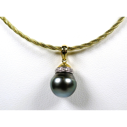 484 - 9ct Yellow Gold Pendant set with a Dusky 10mm Pearl and Diamond surround hung on an 18inch 9ct Twist... 