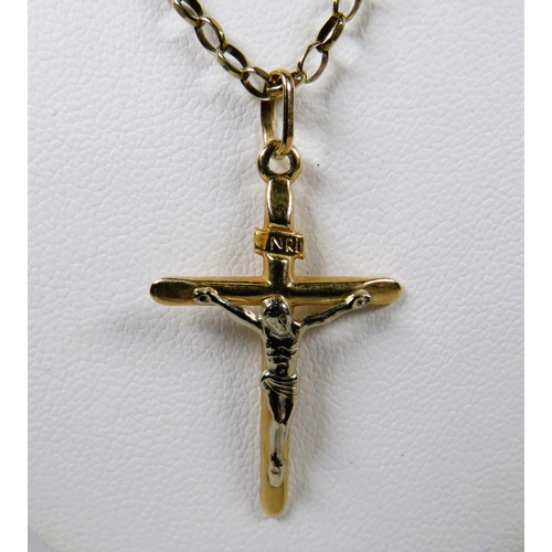 485 - 9ct Yellow & White Gold Crucifix which measures 32mm long, Hung on a 22 inch, 9ct Gold Belcher chain... 