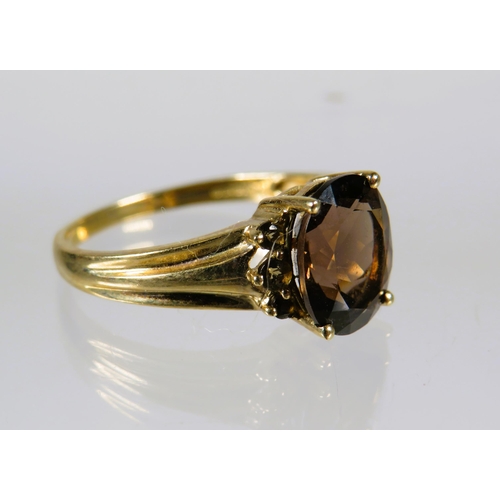 486 - 9ct Yellow Gold Ring set with a Smokey quartz (10 x 8mm ) with Melee Diamonds to shoulders. Finger s... 