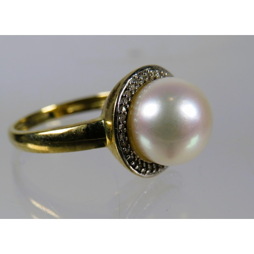 493 - 9ct Yellow Gold Ring set with a 10mm Pearl with Diamond Surround.  Finger size 'N-5'    3.5g