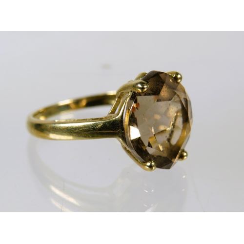 494 - 9ct Yellow Gold Smokey Quartz Set ring (12 x 10mm)   Finger size 'O-5 to P'    3.1g