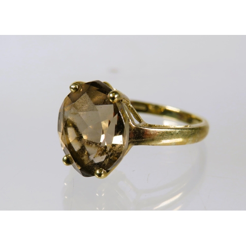 494 - 9ct Yellow Gold Smokey Quartz Set ring (12 x 10mm)   Finger size 'O-5 to P'    3.1g