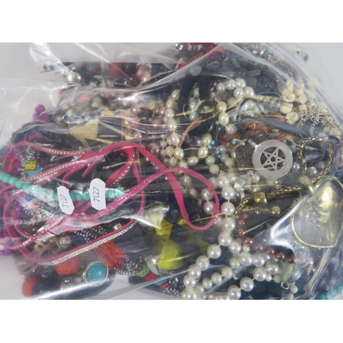 979 - Approx 7 Kilos of assorted costume Jewellery.  See photos.