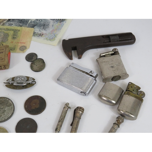 850 - Mixed collectables lot including lighter, medals, tokens, banknotes, pencils and some silver items.