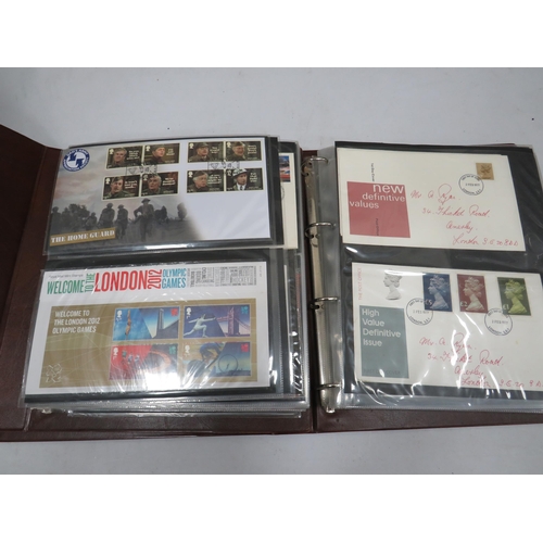 1555 - Full and well presented Album of Mint UK Presention packs, FDC's   some coin FDC's see photos.